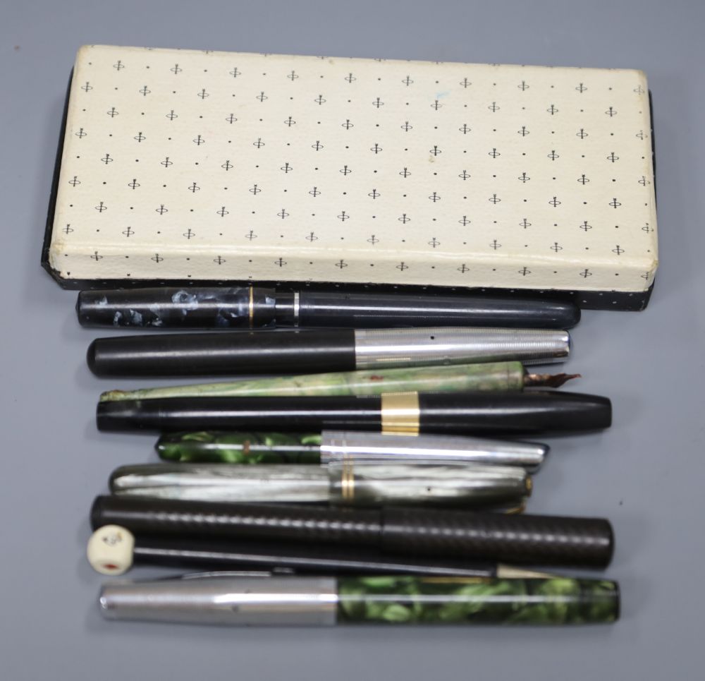 A cased Parker 17 fountain pen and pencil set and other fountain pens